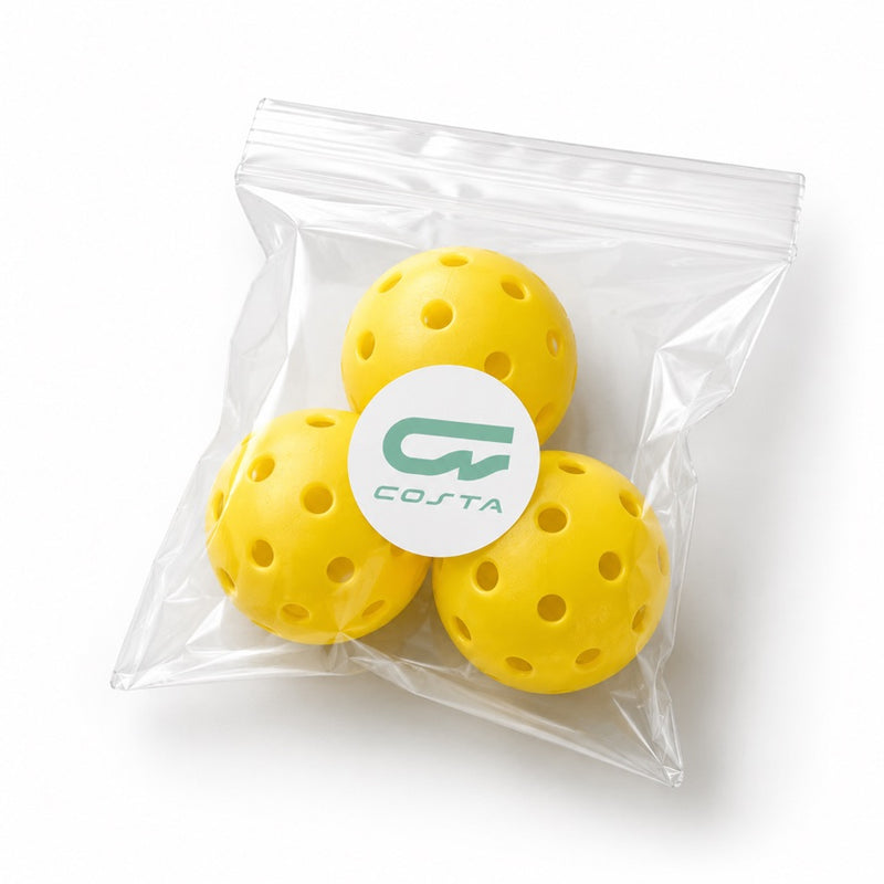 Costa Court Pack with three yellow outdoor pickleballs in a Costa-branded bag