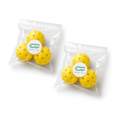 Costa Court Pack with six yellow outdoor pickleballs in two Costa-branded bags